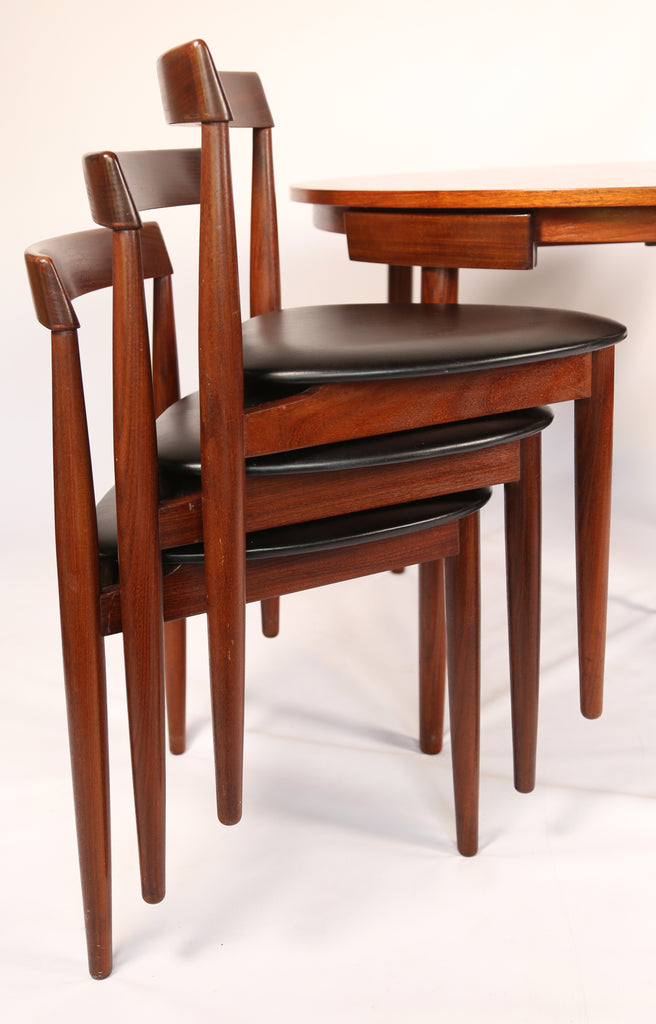 Teak 'Roundette' extending table with 6 nesting chairs by Hans Olsen for Frem Røjle (1952)