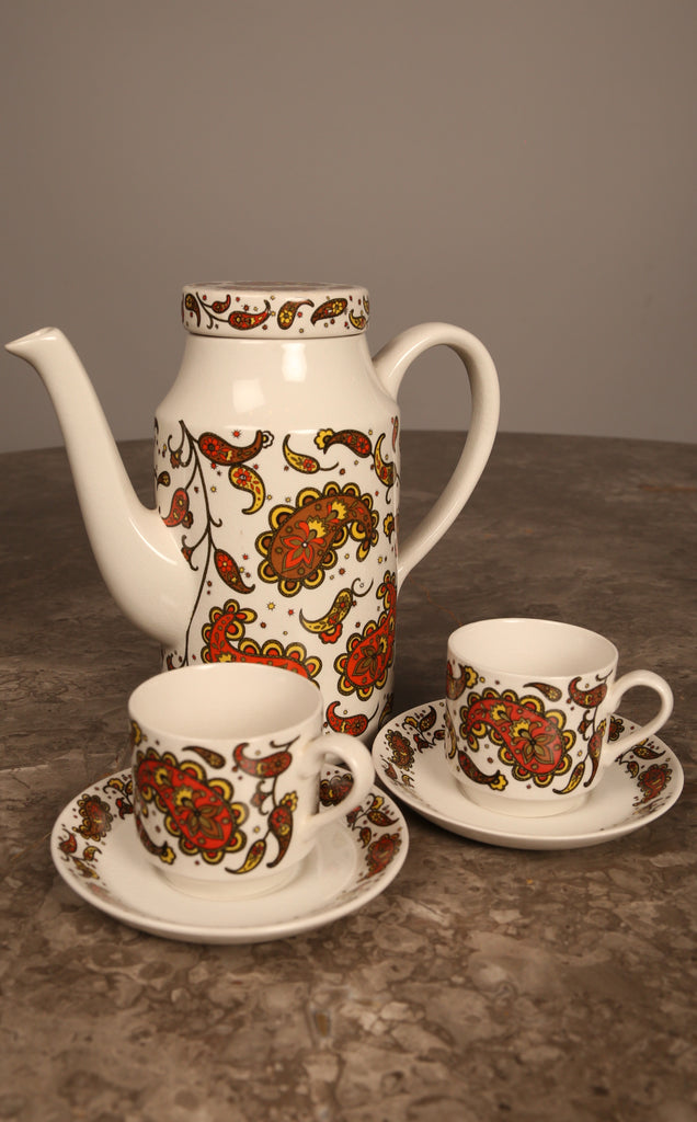 A midwinter pottery coffee set in 'Scarce Baroque' pattern by Jesse Tait (1960s)