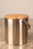 Arne Jacobsen for Stelton, a stainless steel 1960s ice bucket and tongs with teak lid (1960s) Denmark