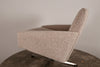 Midcentury swivel chair in pure wool boucle