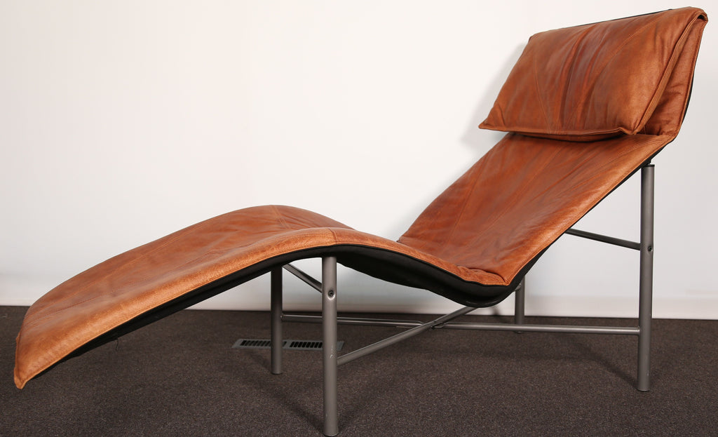 A pair of tan leather Skye Loungers by Tord Björklund for Ikea (1980s)